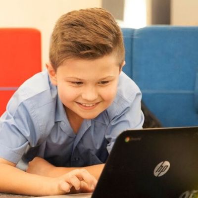 marcus_papic_remote_learning Marcus Papic of Holy Spirit Primary Remote Learning at computer