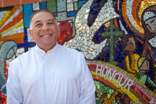 Queen honours Brother Nicholas Harsas for his service Principal of Holy Spirit Catholic Primary School Carnes Hill, Brother Nicholas Patrick Harsas