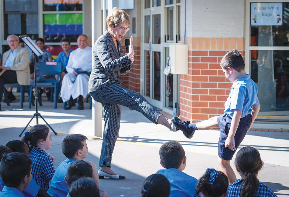 Governor of NSW goes back to school Governor of NSW Margaret Beazley and Holy Spirit Carness Hill student Nicholas doing karate moves