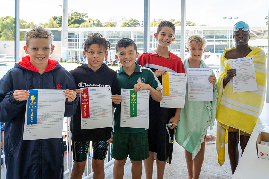 Ribbon winners from SCS’ 2021 Archdiocesan Swimming Carnival