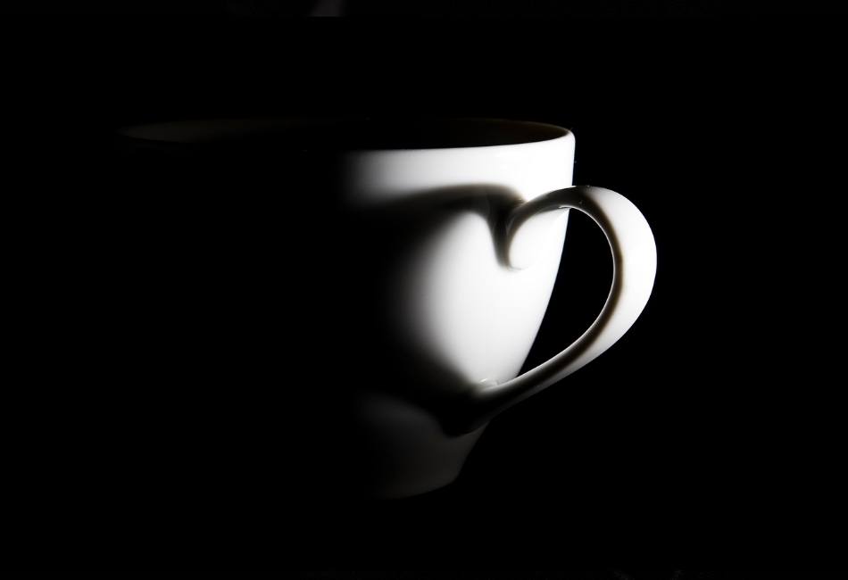 My cup is full Image of a cup with a love heart shadow