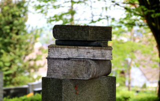 Books on a tombstone. The critical thinking skills fostered by philosophy are prized today.