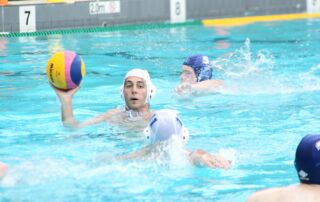 Students take to the pool for Sydney Catholic Schools' inaugural inter-school water polo match.