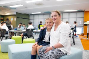 A student and parent of St Mary's Cathedral College and choir in the classroom.