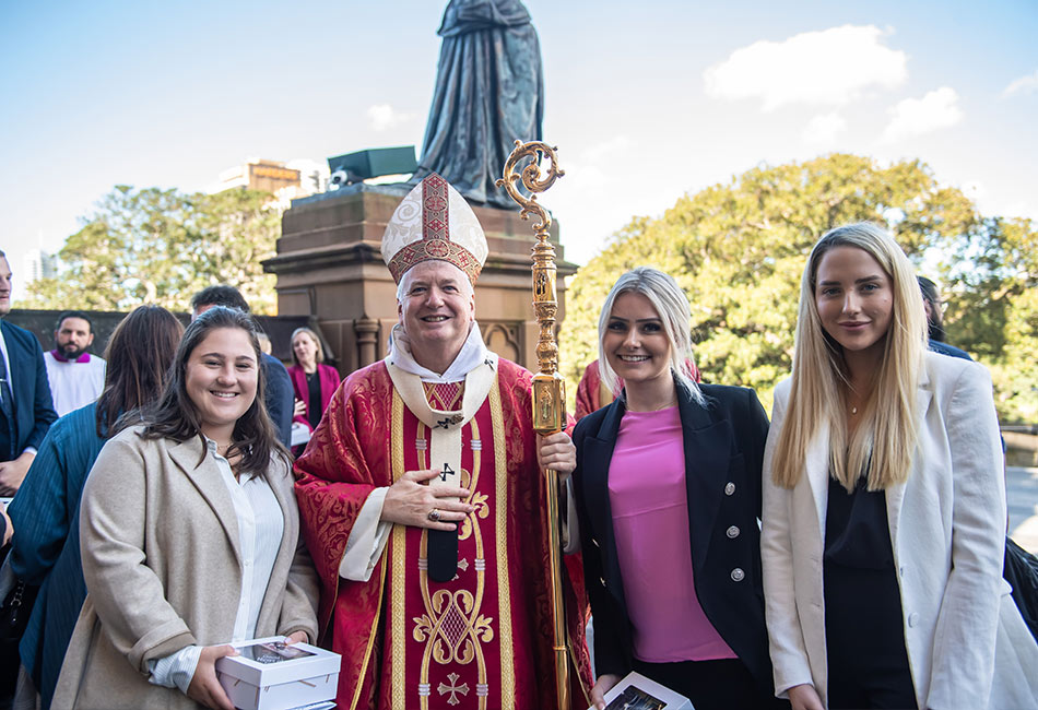 Archbishop of Sydney Anthony Fisher OP with some of Sydney Catholic Schools newest teachers. Photo: Giovani Portelli