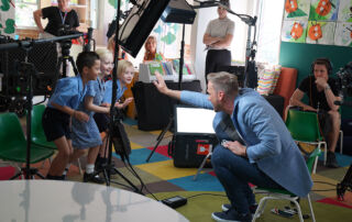 Today Presenter Tim Davies high fives St Francis de Sales Catholic Primary School Woolooware students