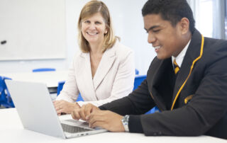 Teacher and student complete mathematics online learning modules