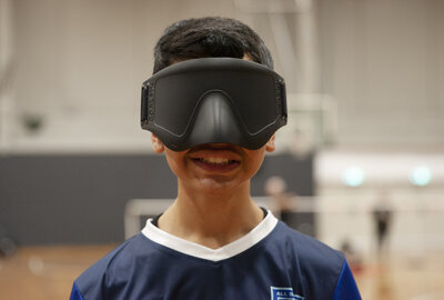 A Sydney Catholic Schools' goalball athlete wearing his blackout shades 