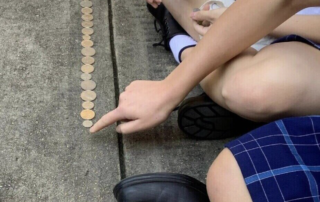 Mount St Joseph Milperra students take part in a fun coin challenge to help raise money for Project Compassion