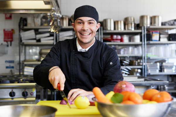 Southern Cross Burwood Southern Cross Catholic College Burwood student Demetrius Thalasselis chopping vegetables