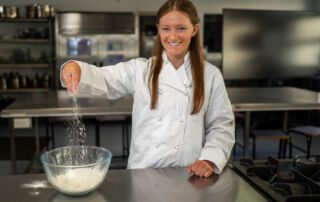 NSW Training Awards winner Charlize Ashby in the kitchen at her school