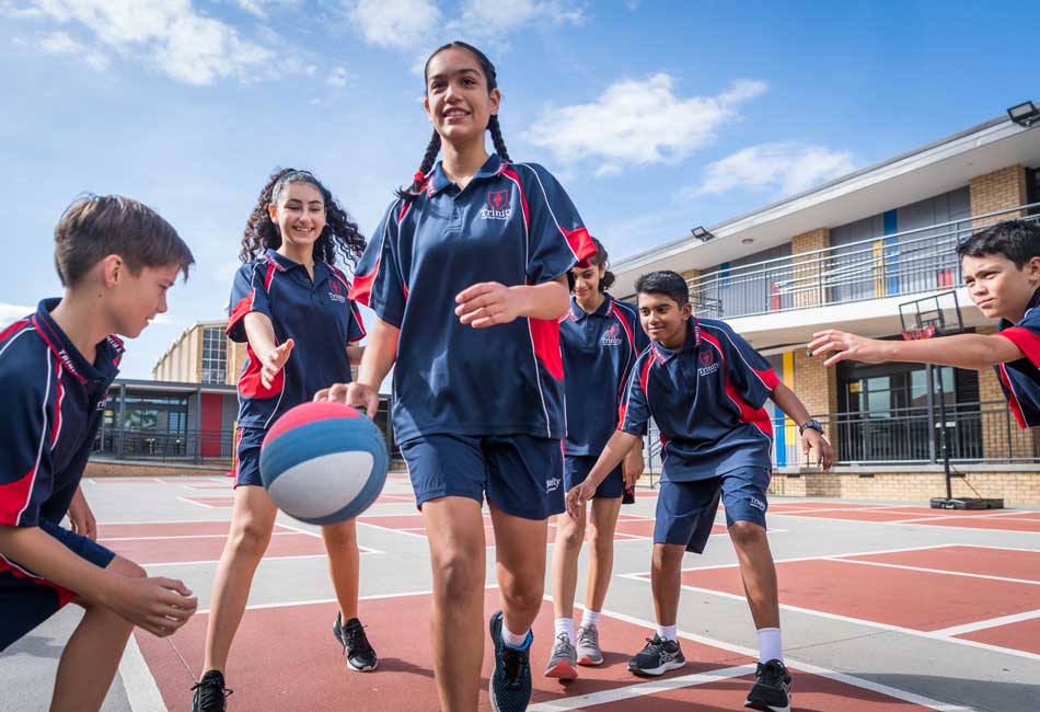 Team sport at Sydney Catholic Schools Students play basketball