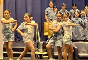 St Brendan's students perform at the 2023 Positive Schools Wellbeing in Action Conference.