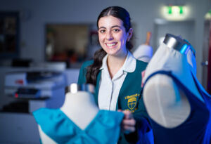 Annabelle Mansour with the swimwear she designed for her HSC Design and Technology major project.