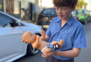 Oscar Murray with the Baby Heat Monitor he designed for the STEM MAD National 2023 competition.