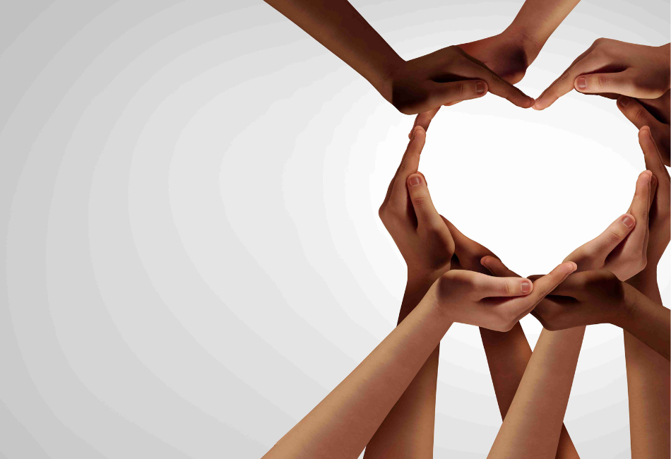 Resized Images For SCS Websites A group of students hands and arms clasp together in support to make the outline of a heart