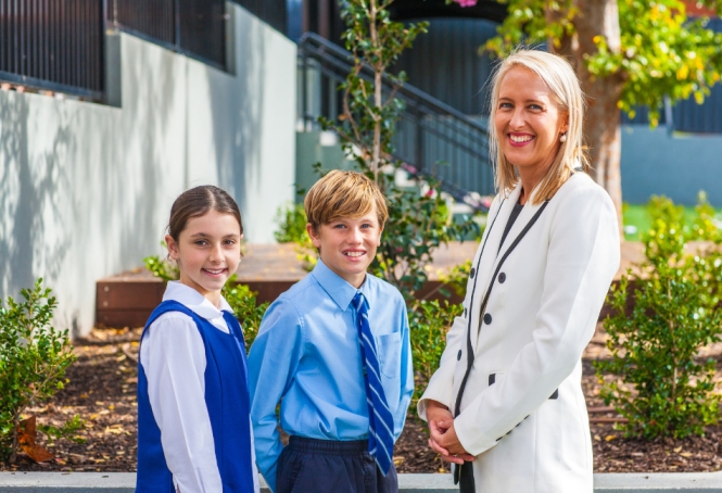 Resized Images For SCS Websites (1) Image of Principal Diane Cowan with female and male students