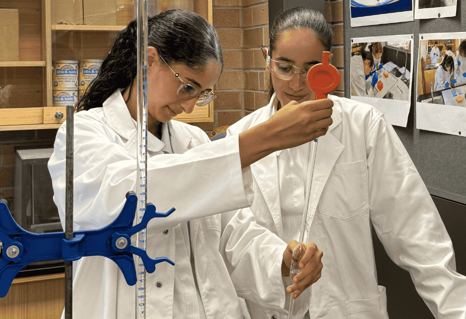Two students from Mount St Joseph (MSJ) Milperra experimenting in a science lab A photo of two students from Mount St Joseph (MSJ) Milperra experimenting in a science lab
