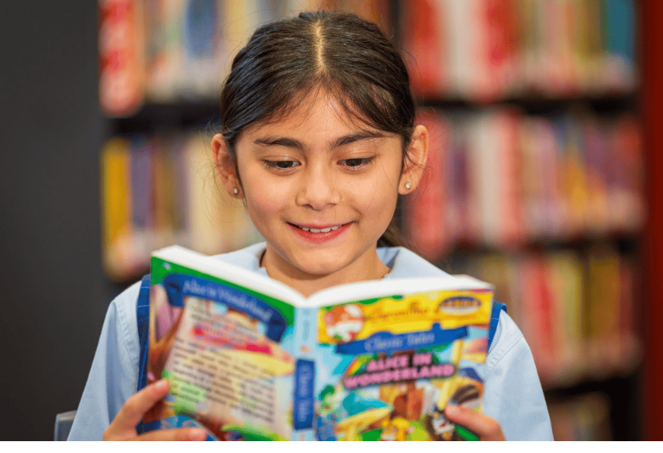 A photo of a student at St Anthony’s Catholic School Marsfield reading in the library A photo of a student at St Anthony’s Catholic School Marsfield reading in the library