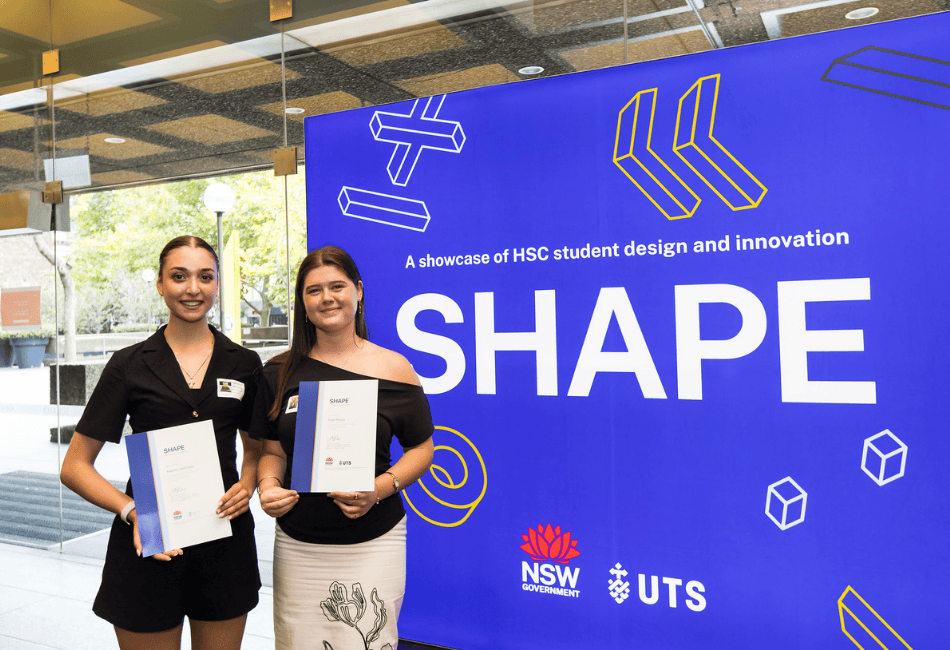 A photo of Pyper Paszyn and Angelina Sanfilippo celebrate being included in SHAPE 2026 for their outstanding projects