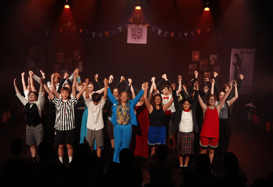 A photo showing the entire cast of The Shakespeare Project taking a bow at the conclusion of a performance A photo showing the entire cast of The Shakespeare Project taking a bow at the conclusion of a performance