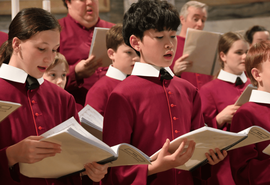 A photo of students from the St Mary’s Cathedral Choir singing