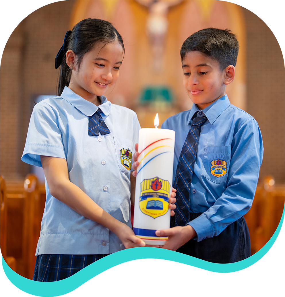 Two Students looking at a candle