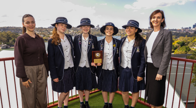 A photo showing the four Marist Sisters' College Woolwich Year 12 debating students with Principal Rachel Sampson and Debating and Public Speaking Coordinator Aleksandra Bridge.