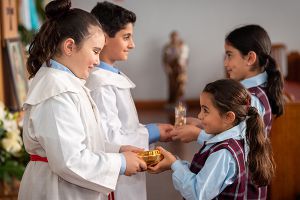 Religious Education students in mass