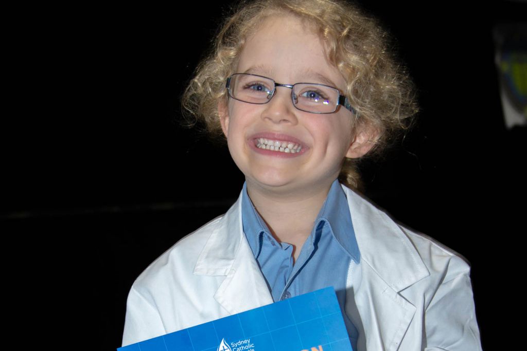 Kindergarten student Sebastian with his STEM award.