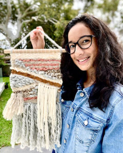 St Ursula's College Kingsgrove student Isabella Muslado with her wall hanging