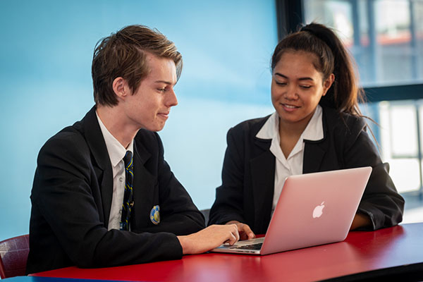 Students studying together at southern Cross Catholic Vocational college Burwood before COVID-19