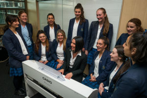 Eva Spata with award-winning acapella students at Marist Sisters’ College Woolwich