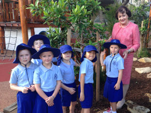 Long-serving St Mary's Catholic Primary School principal Beverly Coffey surrounded by her students