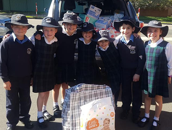 St Michael’s Catholic Primary School Meadowbank students with items donated for families in Lebanon
