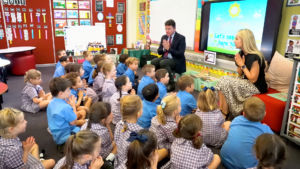Sydney Catholic Schools' Executive Director, Anthony Farley, and teacher Fiona Mace with Kindy students