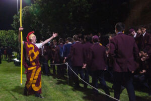 Holy Cross’ gladiator mascot rallying the maroons fans