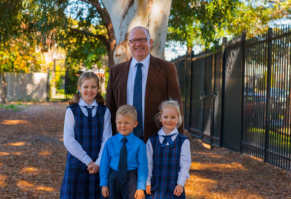 Sydney Catholic Schools' principal Bernard Ryan with students