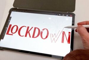 Word 'lockdown' drawn on an iPad