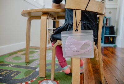 COVID mask hanging of student's chair