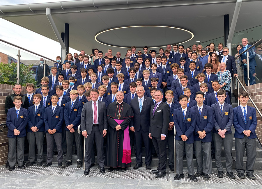 PM Scott Morrison is flanked by De La Salle Catholic College Caringbah students and other dignitaries