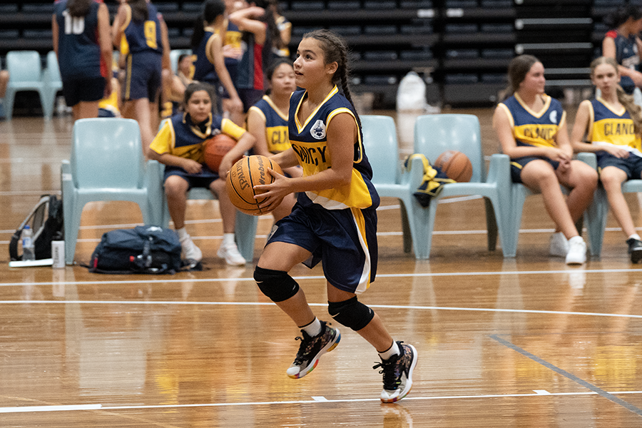 Girl playing Basketball