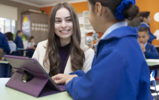 Marina Eldahr teaches a student at St Mary's Catholic Primary School Georges Hall