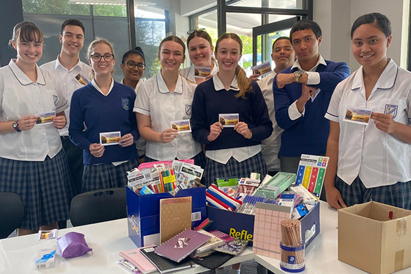 Tongan Appeal 2022, students from All Saints Liverpool pose with their community donations