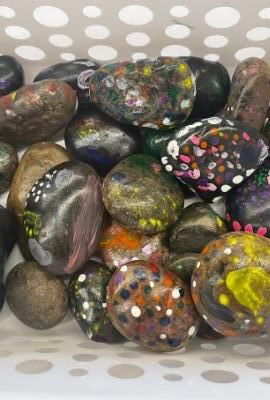 St Brendan's Annandale students painted these song stones as part of Reconciliation