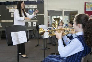 Classroom music teacher Peta Haynes leads an Amadeus Music Program lesson