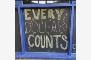 A sign that says Every Dollar Counts was displayed at Mount St Joseph Milperra during its 2022 Project Compassion fundraiser