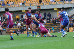 Action on the field during the 2022 Peter Mulholland Cup (NSW/VIC/ACT) competition Grand Final