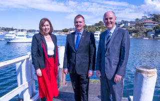 Sydney Catholic Schools' principals Leonie Pearce, Peter Buxton and Stephen Mahoney at Gunnamatta Bay in the Sutherland Shire
