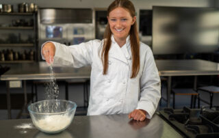 NSW Training Awards winner Charlize Ashby in the kitchen at her school